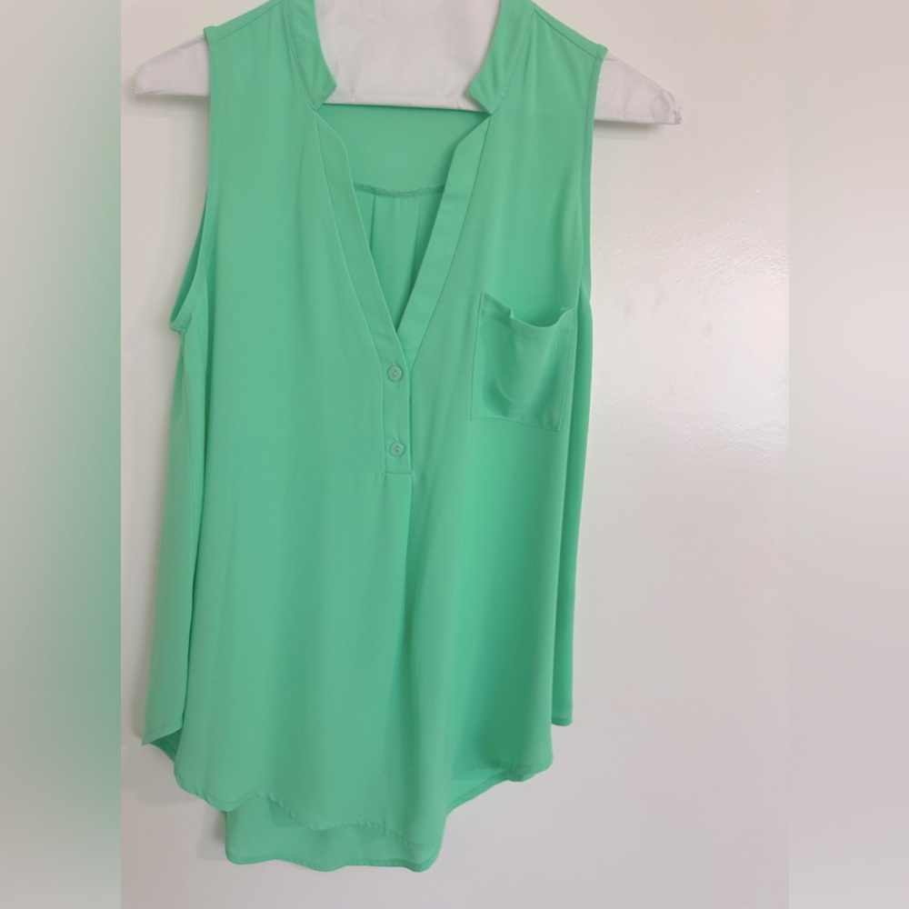 Mint green tank top blouse.
